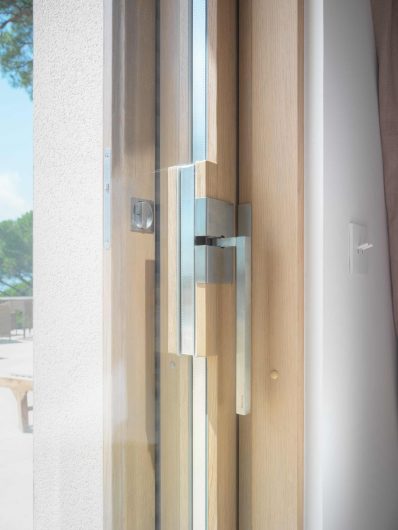 Detail view of a lift and slide sash with custom handle