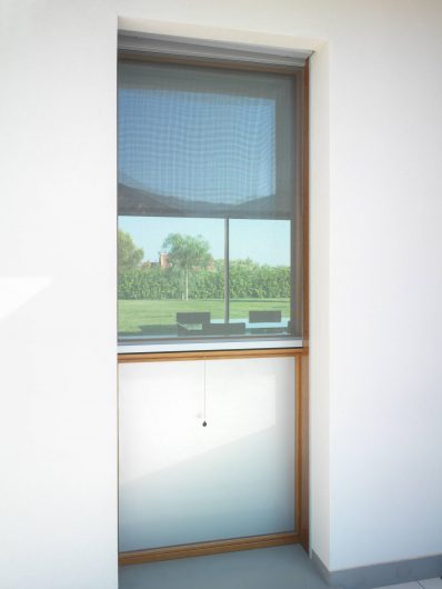 External view of a window with mosquito net