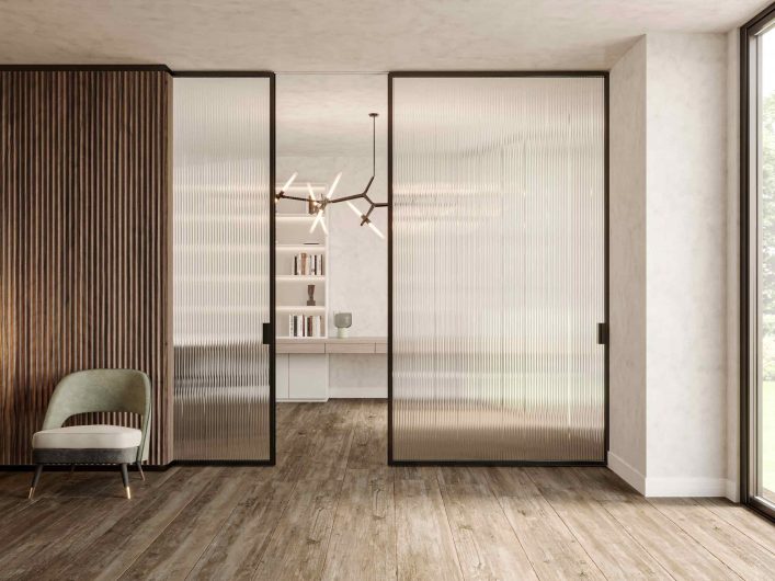 Lady sliding door with wooden frame and ribbed transparent glass