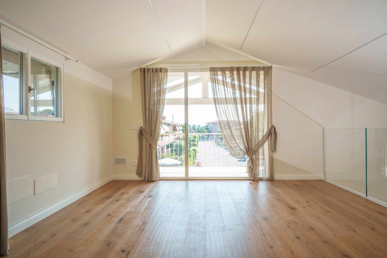 View of the loft with Skyline Classic French window with asymmetrical doors