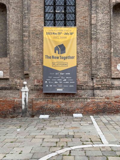 Banner of the exhibition on the facade of the Scuola Grande di Misericordia